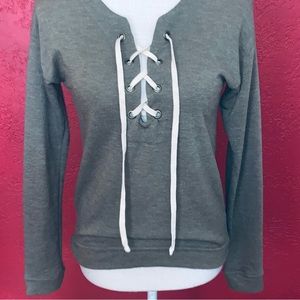 Women’s sweatshirt type top laces at neck olive green color size small